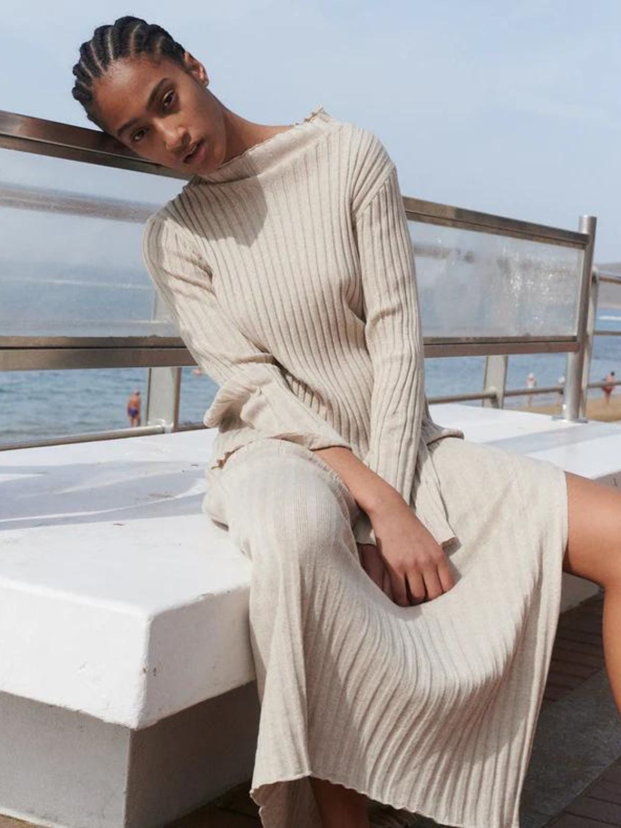 A woman wearing The Knotty Ones knitted dress