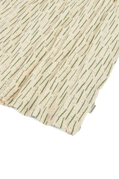 Textured fabric with a subtle pattern on a white background