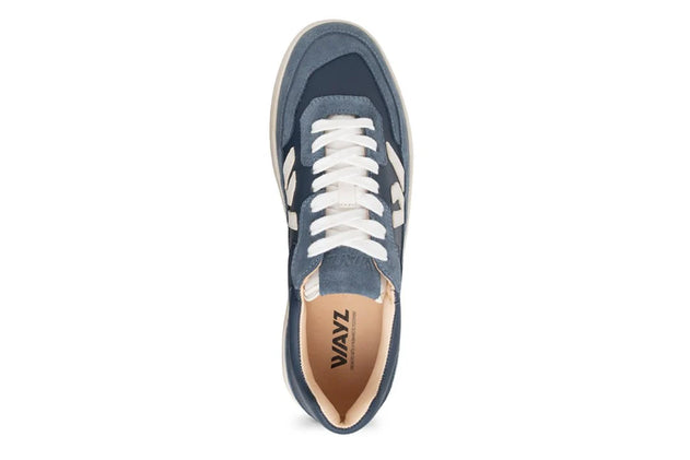 Navy blue sneaker with white laces on a white background