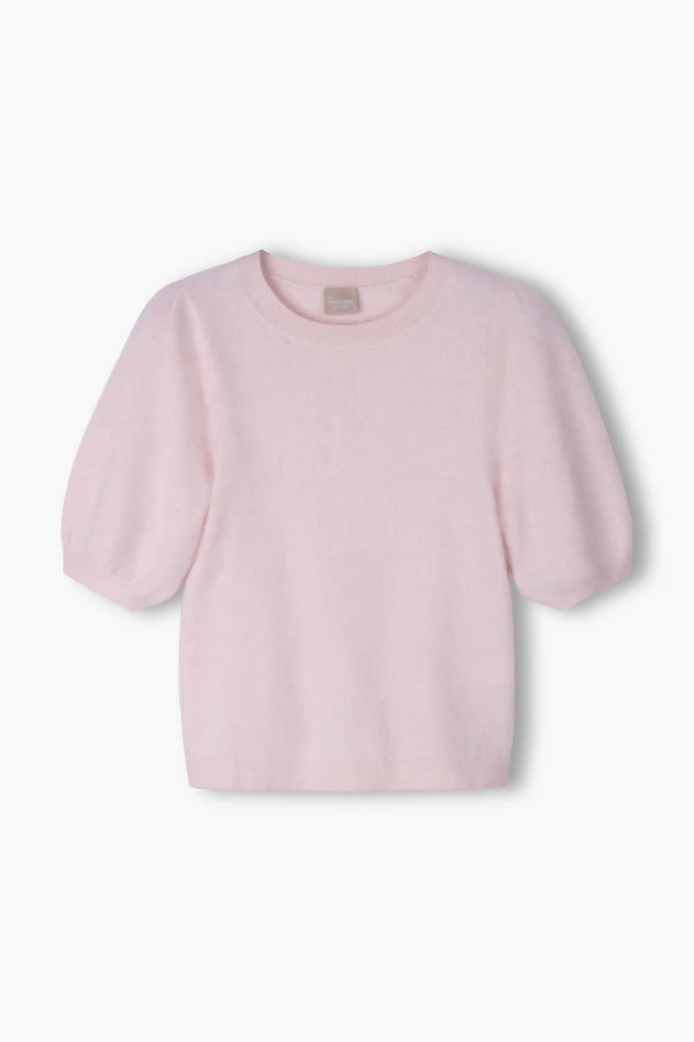 Pale pink cashmere puff-sleeve sweater, back view