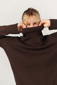 Chocolate merino wool turtleneck sweater, side view