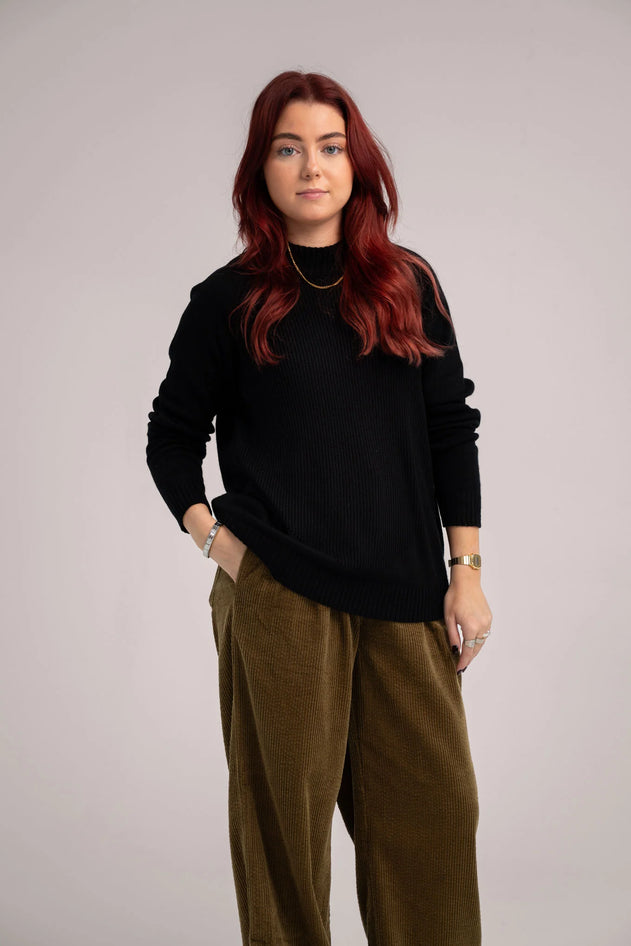 Black merino wool sweater, front view