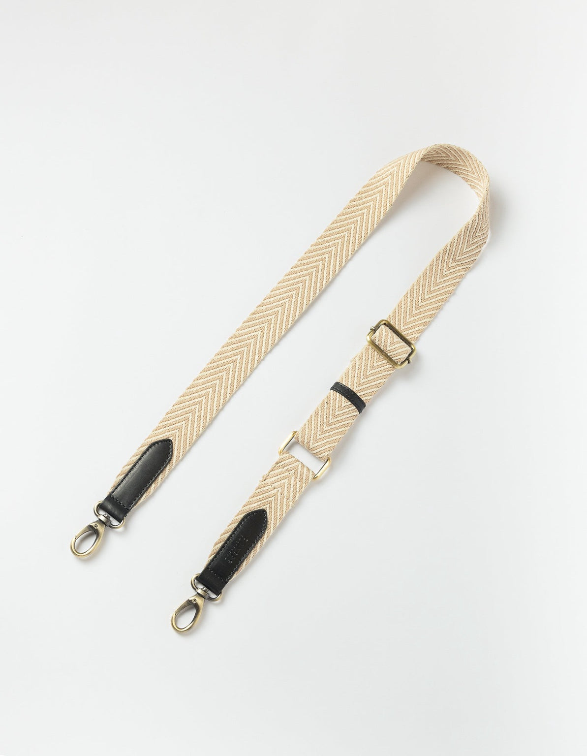 Herringbone Tasriem Zand & Zwart, Classic leer