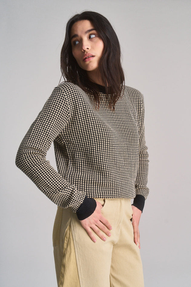 Black and cream white organic cotton sweater, front view