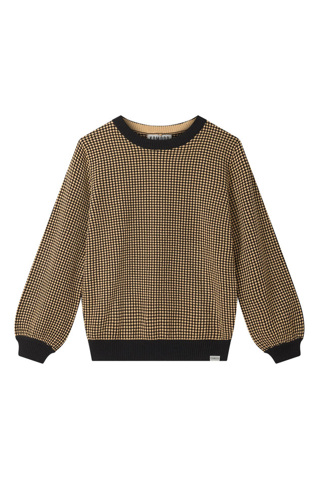 Woman wearing Komodo black organic cotton jumper