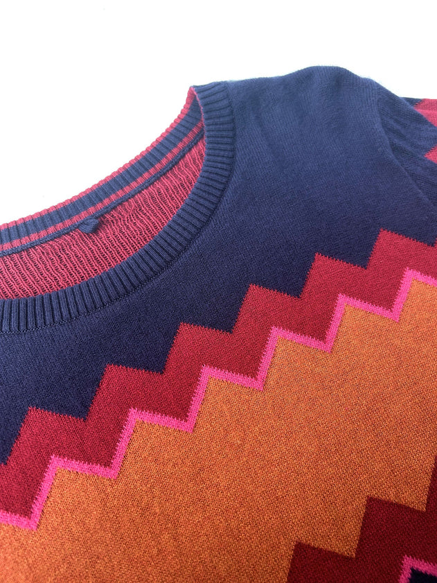 Woman wearing Komodo chevron blue knitted top