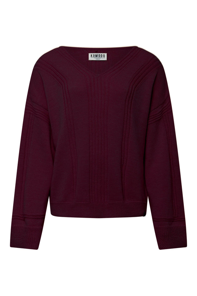 Woman wearing Komodo walnut brown merino wool jumper