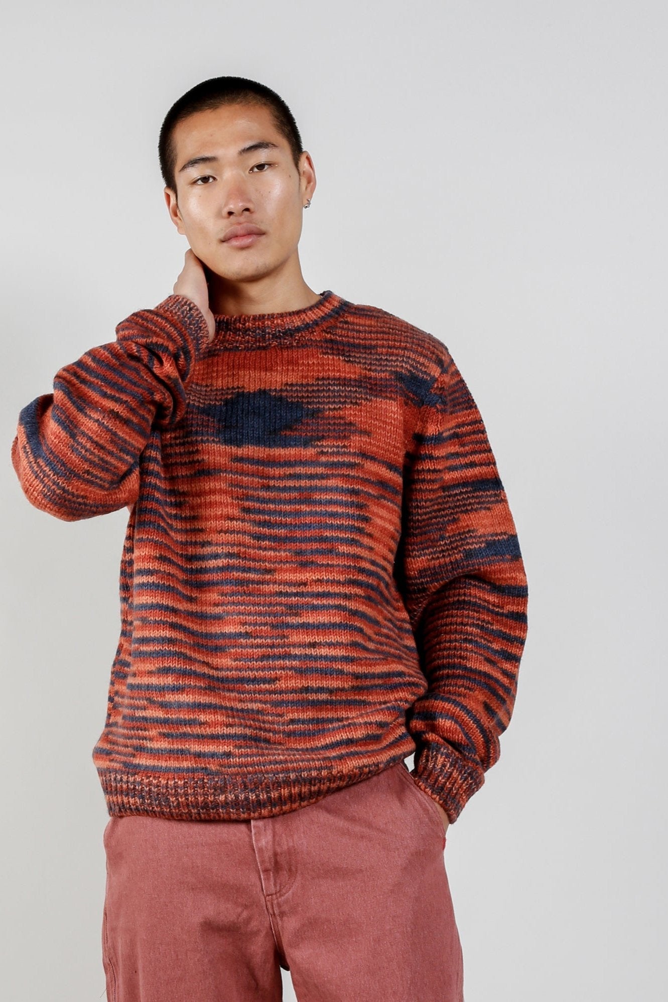 Temura red hand-knitted lamb wool sweater, front view