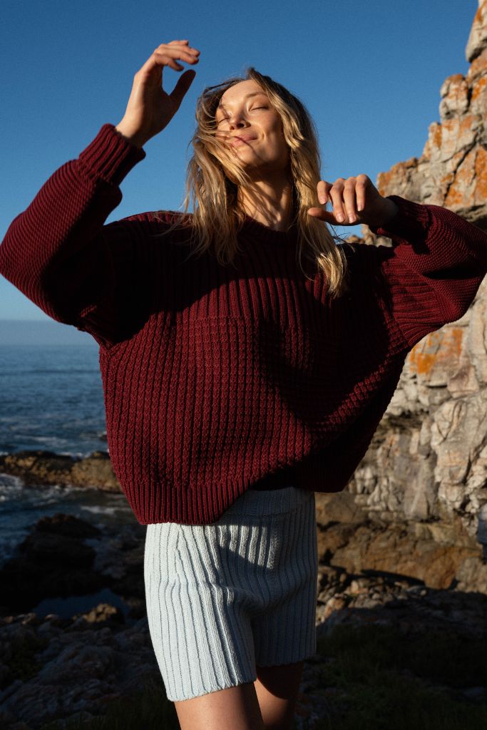 A woman wearing The Knotty Ones Delcia Hellebore Cotton Knit