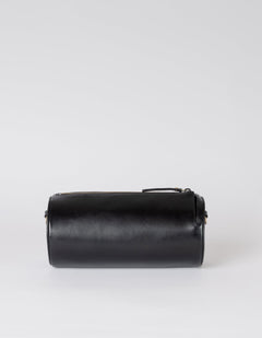 Black cylindrical leather product on a white background