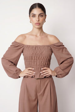 magnific__ultra-strict-waistup-fashion-pose-offshoulder-slee__96117_68ebdf3c-c533-4c47-b1b3-81cc1eee9a94.jpg?v=1779799310