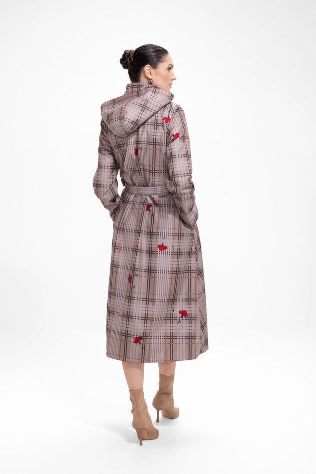 rainsisters-coat-blush-of-the-crown-waterproof-beige-plaid-print-back-in-motion.jpg?v=1779050731