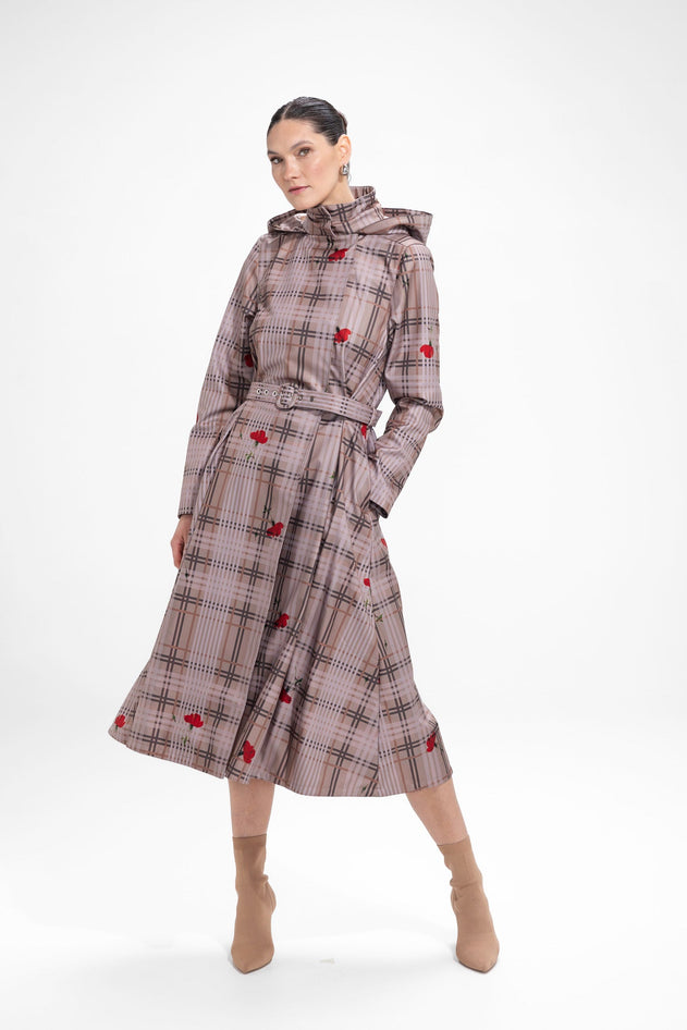 rainsisters-coat-blush-of-the-crown-waterproof-beige-plaid-print-in-motion.jpg?v=1779050731