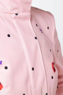 rainsisters-coat-cotton-candy-waterproof-pink-floral-print-close-up.jpg?v=1779051030