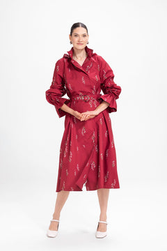 rainsisters-coat-crimson-lily-waterproof-red-floral-in-motion.jpg?v=1779051704