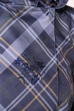 rainsisters-coat-duchess-in-blue-waterproof-blue-plaid-close-up.jpg?v=1779052299