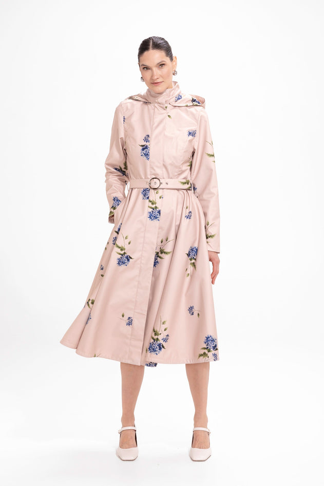 rainsisters-coat-gentle-bloom-waterproof-beige-floral-in-motion.jpg?v=1779053356