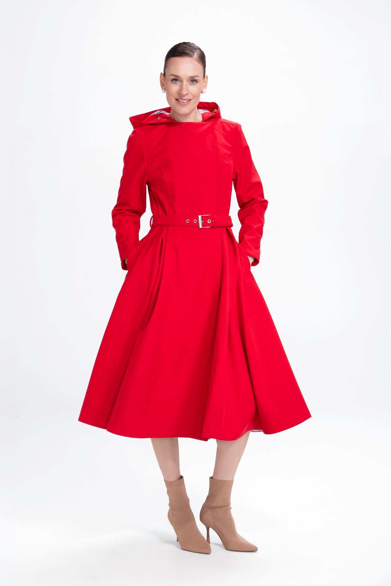 rainsisters-coat-queen-of-hearts-waterproof-red-in-motion.jpg?v=1779056212