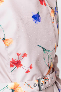rainsisters-coat-spring-bloom-waterproof-beige-floral-close-up.jpg?v=1779057666